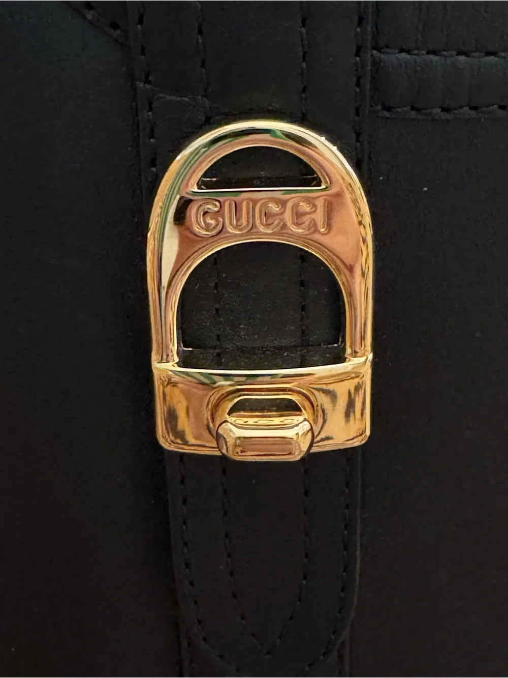 GUCCI Women’s Black Leather Knee-High Riding Boots with Gold Buckle
